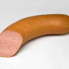Eine aufgeschnittene Fleischwurst mit feiner, rosa Einlage. Der Unterschied zur Lyoner ist die gröbere Struktur.